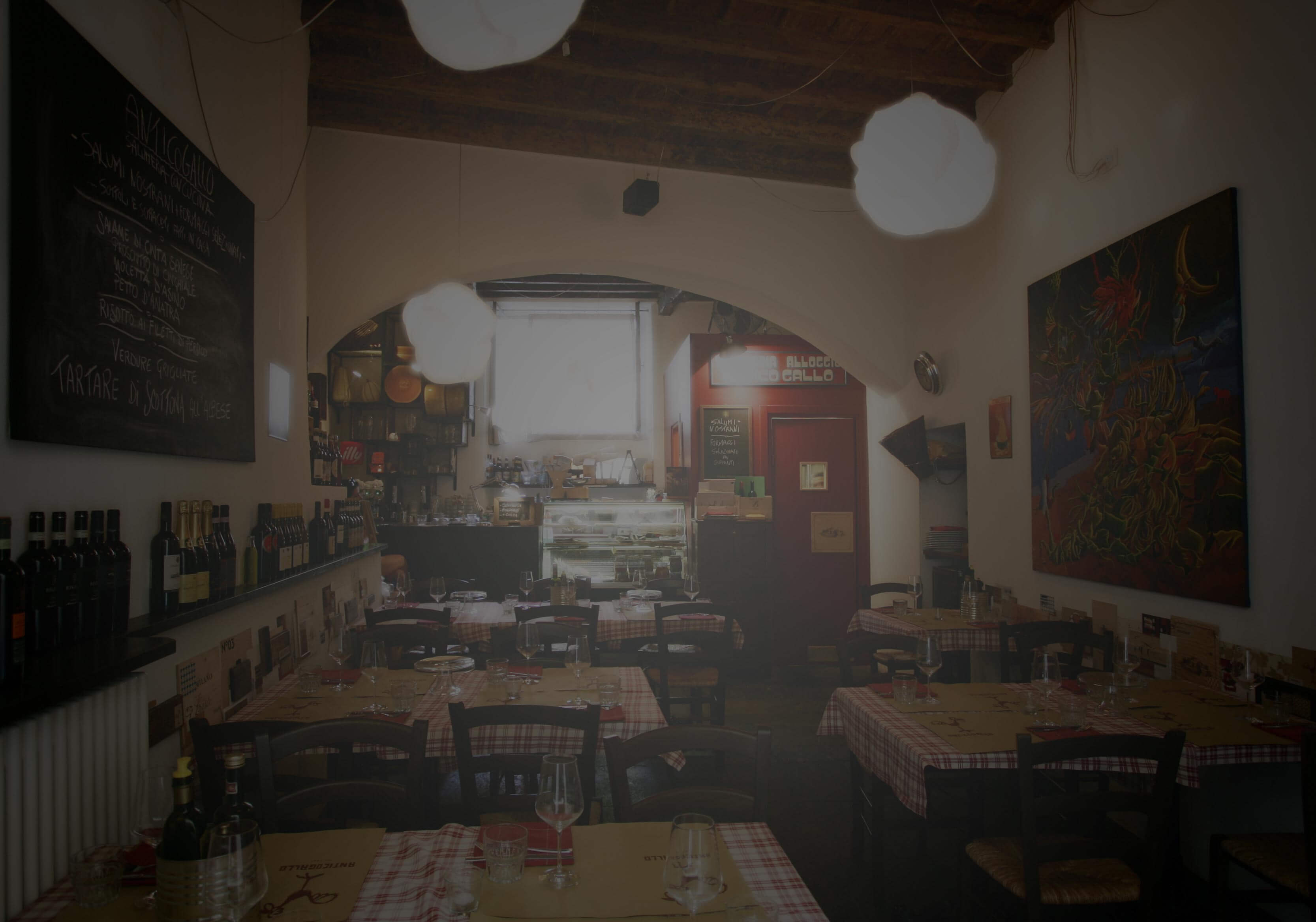 The dining room of Antico Gallo, a Piedmontese osteria in Arona on Lake Maggiore